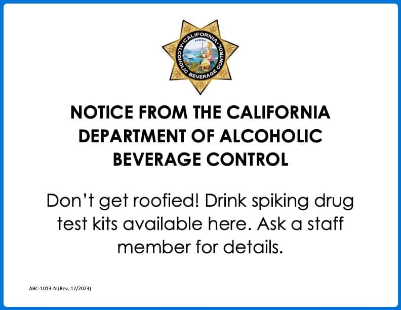 California ABC sign reading “Don’t get roofied! Drink spiking drug test kits available here.