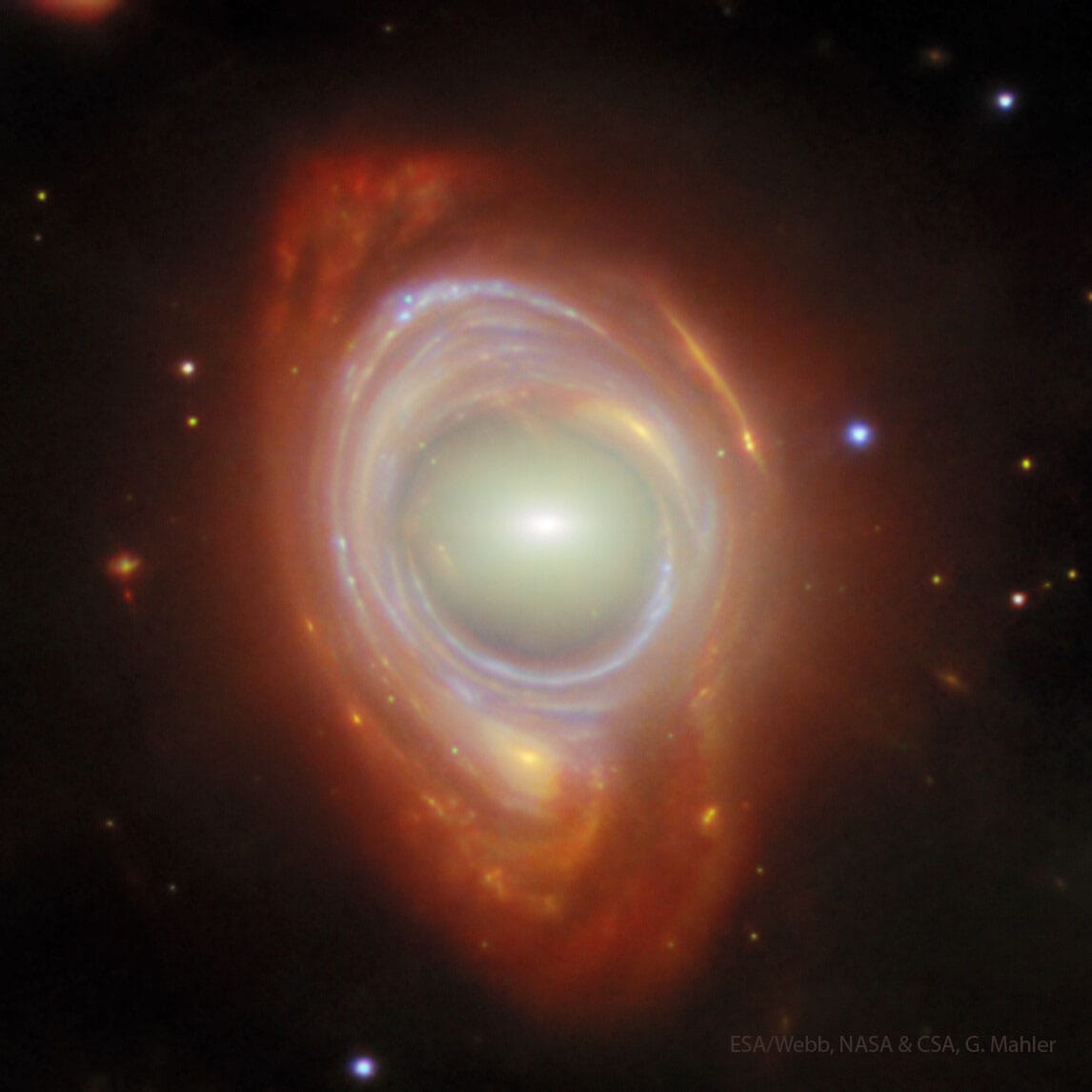Webb Telescope captures Einstein ring alignment between two galaxies.